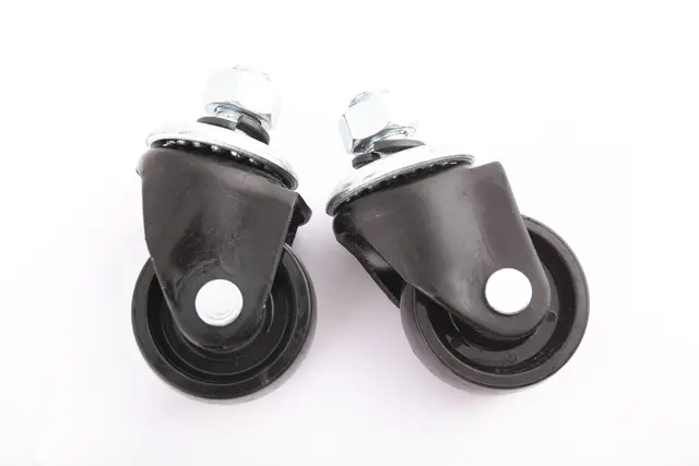 PAIR OF PIVOTING WHEELS Ø60x30mm Clas 