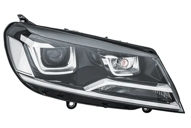 VW Hovedlampe høyre Hella 