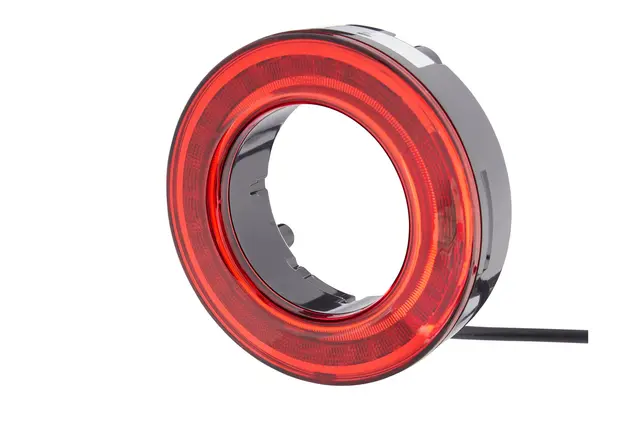 Kombinasjon baklampe bak/brems 12v rund Hella 